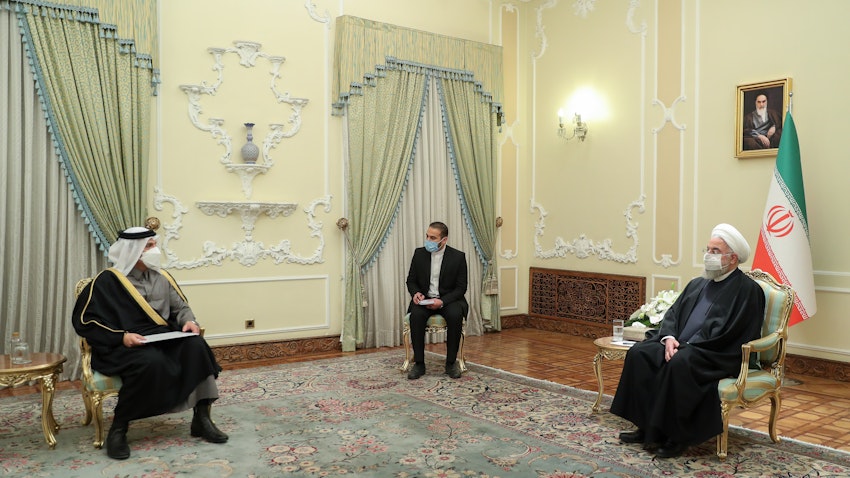 Qatar's chief diplomat meets Iran's president in Tehran on Feb. 15, 2021. (Photo via the Iranian presidential office's website)