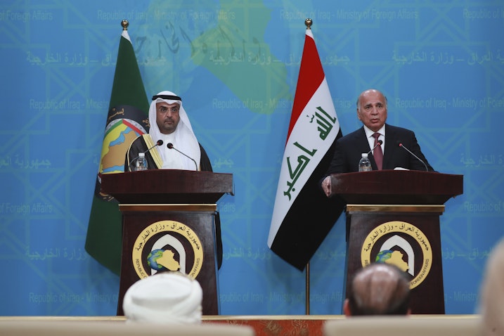 GCC Secretary Nayef Al-Hajraf (left) and Iraqi Foreign Minister Fuad Hussein (right) hold a joint press conference in Baghdad, Iraq on Feb. 1, 2021.  (Photo via Getty Images)