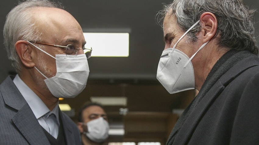 Iran’s nuclear chief Ali Akbar Salehi and IAEA director Rafael Grossi in Tehran on Feb. 21, 2021. (Photo by Mohammad Babai via IRNA news agency)