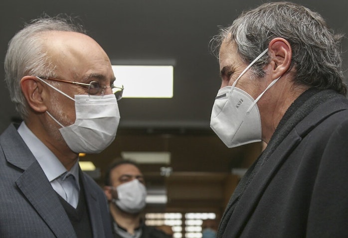 Iran’s nuclear chief Ali Akbar Salehi and IAEA director Rafael Grossi in Tehran on Feb. 21, 2021. (Photo by Mohammad Babai via IRNA news agency)