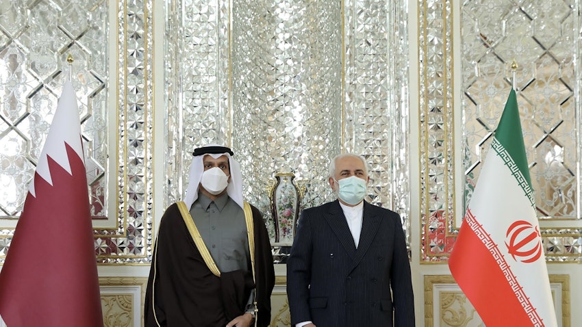 Qatar's Foreign Minister meets his Iranian counterpart in Tehran, Iran on Feb. 15, 2021 (Photo via Getty Images)
