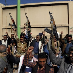 Houthi fighters protest against the US decision to list the group as a foreign terrorist organization on Jan. 20, 2021 in Sana'a, Yemen (Photo via Getty Images)