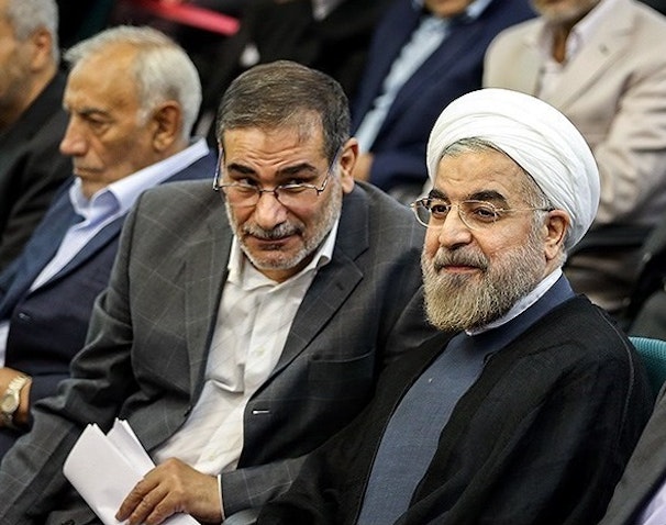 Hassan Rouhani and Ali Shamkhani at a summit for Iranian veterans of the 1980-88 Iran-Iraq war. Tehran, Iran. July 16, 2013. (Photo by Hamed Malekpour via Tasnim News Agency)