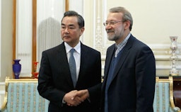 Former parliament speaker Ali Larijani (right) meets Chinese Foreign Minister Wang Yi in Tehran on Jan.21, 2015. (Photo by Majid Asgaripour via Mehr News Agency)