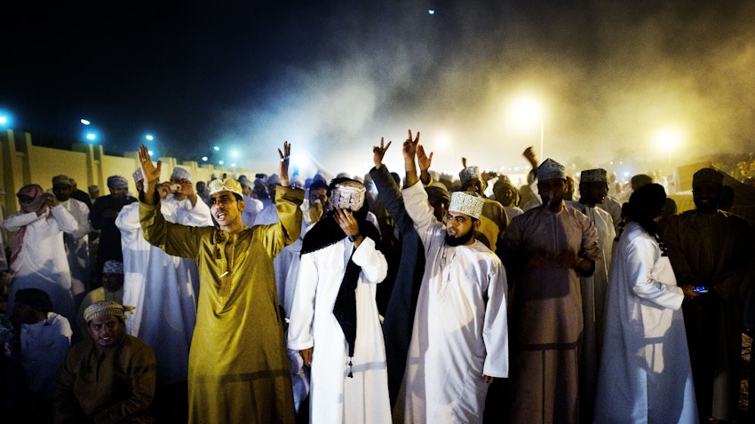 Anti-government protesters gather near Muscat, Oman on March 7, 2011 (Photo via Getty Images)