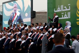 هادي العامري من منظمة بدر خلال مسيرة انتخابية في مدينة البصرة، 21 أبريل/نيسان 2018  (الصورة عبر غيتي إيماجز).