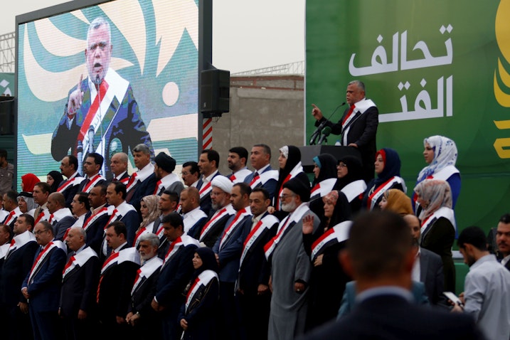 هادي العامري من منظمة بدر خلال مسيرة انتخابية في مدينة البصرة، 21 أبريل/نيسان 2018  (الصورة عبر غيتي إيماجز).
