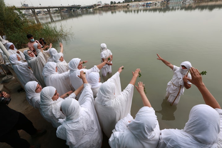 Iraqi Sabaean-Mandaeans perform rituals on the banks of the Tigris River. Baghdad, Iraq, March 15, 2021. (Photo via Getty Images)