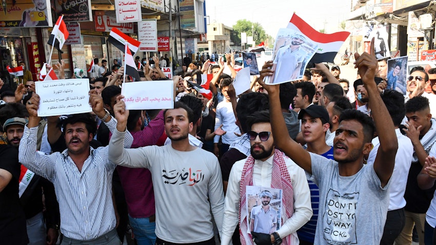 Iraqi demonstrators in the southern city of Nasiriya on Oct. 28, 2020. (Photo via Getty Images)