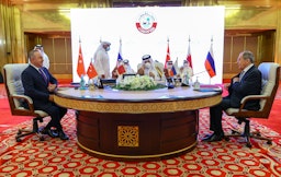 The foreign ministers of Turkey, Qatar, and Russia convene in Doha on March 11, 2021. (Photo via Getty Images)
