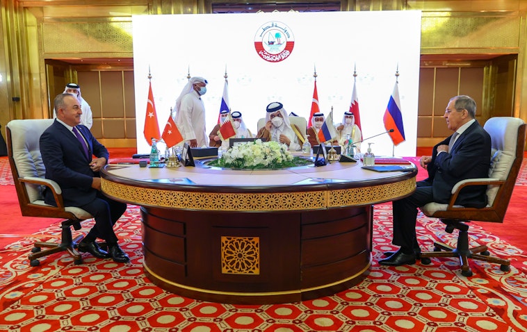 The foreign ministers of Turkey, Qatar, and Russia convene in Doha on March 11, 2021. (Photo via Getty Images)