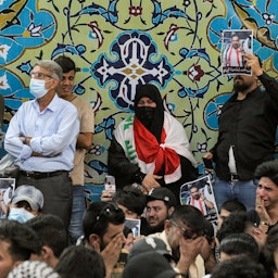 Mourners attend the funeral of assassinated Iraqi activist Ihab Al-Wazni in the city of Karbala on May 9, 2021. (Photo via Getty Images)