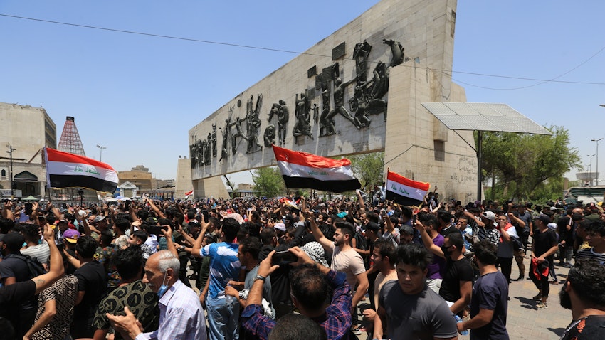 Demonstrators gather at Tahrir Square to protest against a wave of killings of activists and journalists in Baghdad, Iraq on May 25, 2021.  (Photo via Getty images)