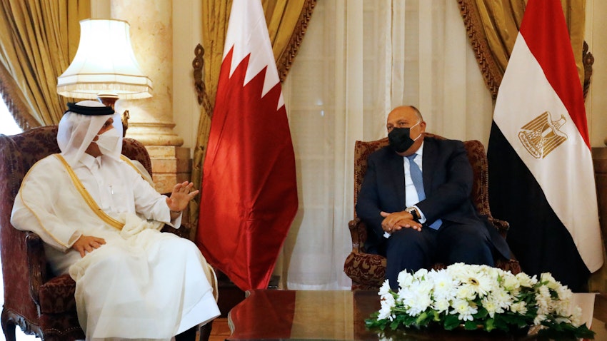 Egyptian Foreign Minister Sameh Shoukry (R) meets with Qatar's Deputy Prime Minister and Foreign Minister Mohammed bin Abdulrahman bin Jassim Al-Thani in Cairo, on May 25, 2021. (Photo via Getty Images)