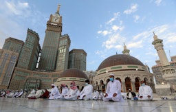 Worshippers perform their morning prayers at the Grand Mosque in Mecca, Saudi Arabia. May 13, 2021. (Photo via Getty Images)