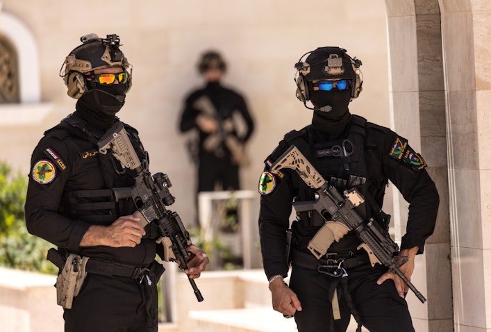 Commandos from the Iraqi Counter-Terrorism Service stand guard at their headquarters on May 31, 2021 in Baghdad, Iraq. (Photo via Getty Images)