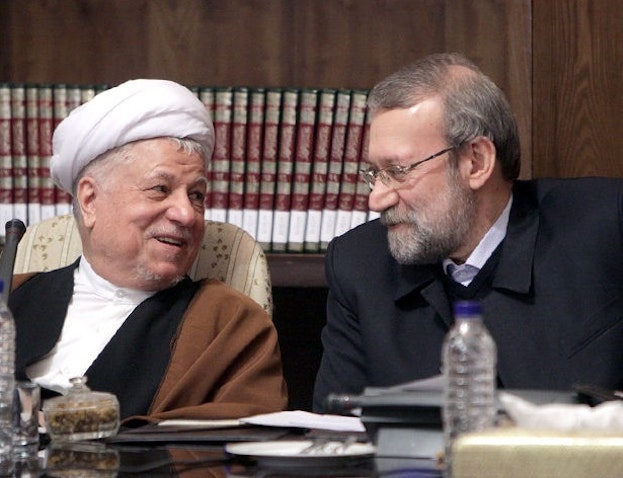 Ali Larijani and Akbar Hashemi Rafsanjani at a summit in Tehran.  Dec. 29, 2013. (Photo by Mohammad Kazempour via Nasim News Agency)