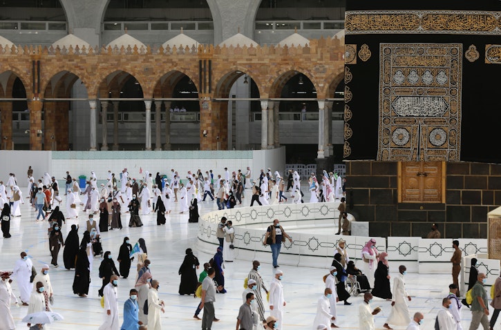 Pilgrims circumambulate around the Kaaba, Islam's holiest shrine, in the holy city of Mecca on Aug. 2, 2020. (Photo via Getty Images)