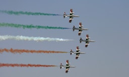 The Italian Frecce Tricolori aerobatic squad at the Dubai Airshow in the UAE on Nov. 16, 2009. (Photo via Getty Images)
