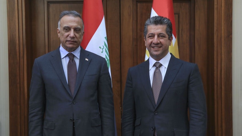 Kurdistan Region Prime Minister Masrour Barzani (R) welcomes Iraq's Prime Minister Mustafa Al-Kadhimi in Erbil on Sept. 10, 2020. (Photo via Getty Images)