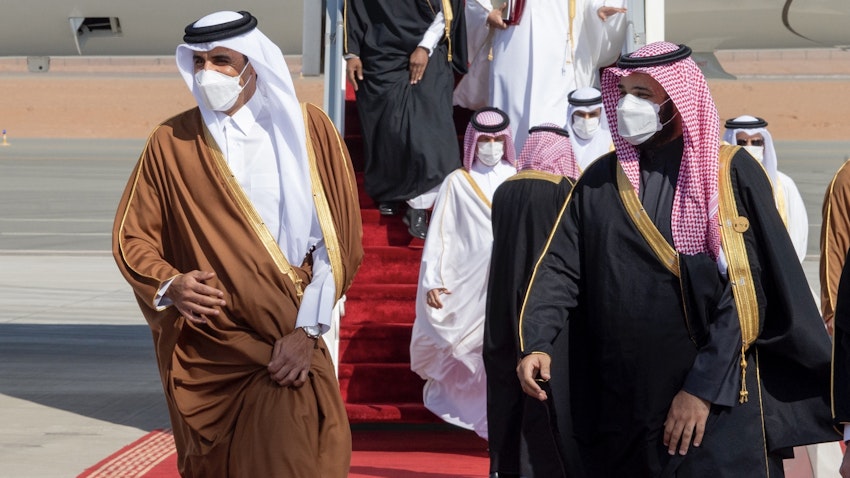Saudi Crown Prince Mohammed bin Salman (R) welcomes Qatar's Emir Sheikh Tamim bin Hamad Al Thani ahead of the 41st GCC summit in Al-Ula, Saudi Arabia on Jan. 05, 2021. (Photo via Getty Images)