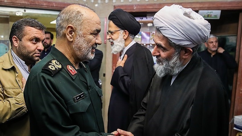 IRGC Intelligence Organization head Hossein Taeb (R) greets IRGC chief commander Hossein Salami (L) at a function in Tehran on June 24, 2018. (Photo by Hamed Malekpour via Tasnim News Agency)