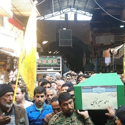 A member of the Fatemiyoun Division killed in Syria is laid to rest in Rey, south of Tehran, on Nov. 18, 2019. (Photo via Fatemiyoun-affiliated social media)
