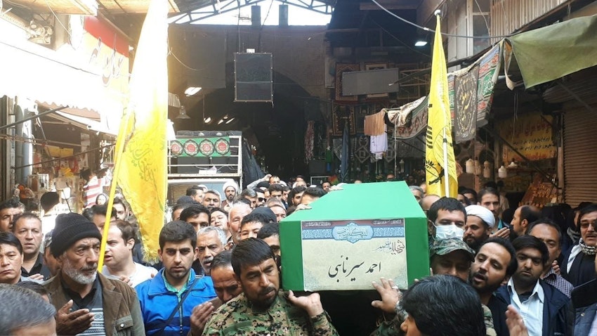 A member of the Fatemiyoun Division killed in Syria is laid to rest in Rey, south of Tehran, on Nov. 18, 2019. (Photo via Fatemiyoun-affiliated social media)