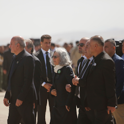 Hero Ibrahim Ahmed along with her son Bafel Talabani mark the arrival of the body of her late husband, former Iraqi President Jalal Talabani in Sulaymaniyah on Oct. 6, 2017. (Photo via Getty Images)