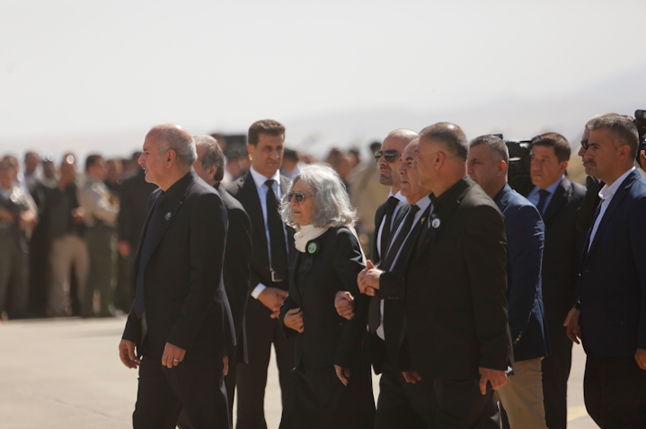 Hero Ibrahim Ahmed along with her son Bafel Talabani mark the arrival of the body of her late husband, former Iraqi President Jalal Talabani in Sulaimaniyah on Oct. 6, 2017. (Photo via Getty Images)