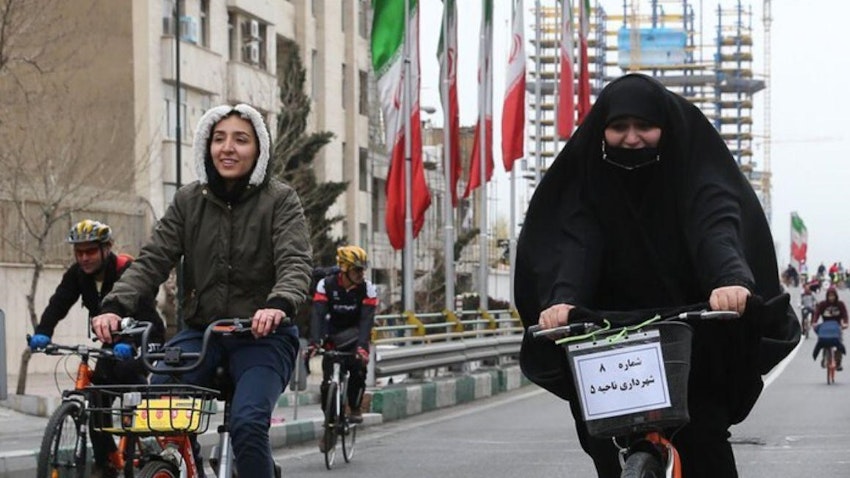 Two Iranian female bicycle riders in Tehran on March 1, 2019. (Photo by Hamid Foroutan via ISNA News Agency)