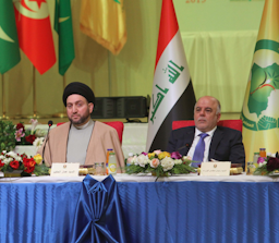Leader of Iraq's Hikmah Movement Ammar Al-Hakim (L) and then prime minsiter Haidar Al-Abadi in Baghdad on Jan. 31, 2015. (Photo via Getty Images)