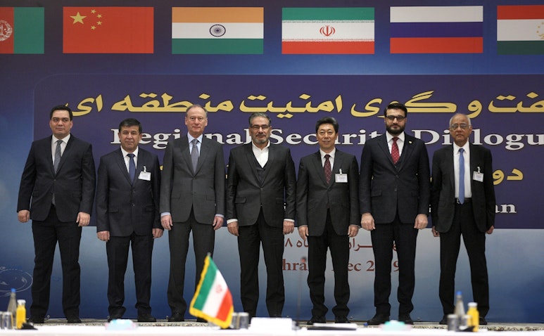 Secretary of Iran’s Supreme National Security Council Ali Shamkhani (C) and Secretary of Russia’s Security Council Nikolai Patrushev (C-L) in Tehran on Dec. 18, 2019. (Photo via Getty Images)