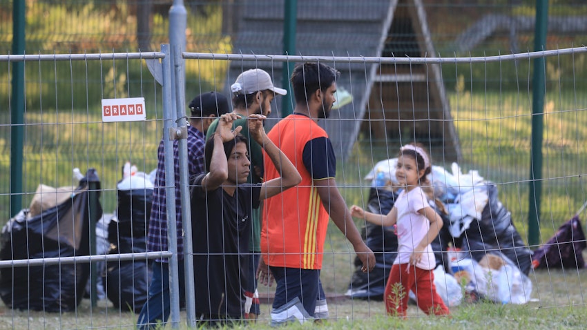 Migrants are seen at a camp near the border town of Kapciamiestis, Lithuania, on July 18, 2021. (Photo via Getty Images)