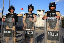 Iraqi riot police protect the Turkish embassy in Baghdad, after calls on social media to protest Turkey’s vows to invade Sinjar, on Feb.18, 2021. (Photo via Getty Images)