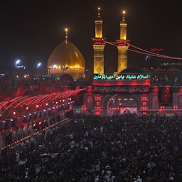 Shiite pilgrims take part in a ceremony at the Hussein ibn Ali Shrine in the southern Iraqi city of Karbala  on Sept. 19, 2018. (Photo via Getty Images)