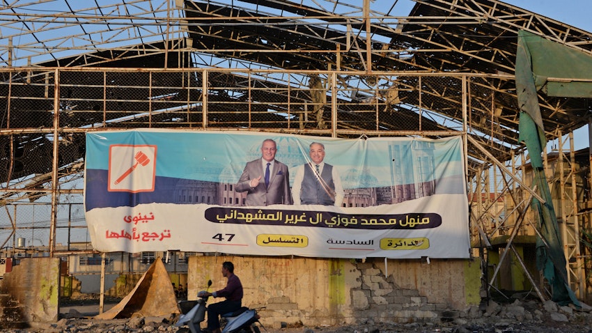 An electoral banner for a candidate ahead of the upcoming parliamentary elections in Mosul, Iraq on Sept. 5, 2021. (Photo via Getty Images)