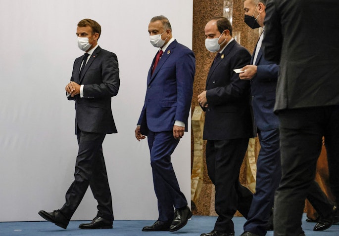 (L to R) French President Emmanuel Macron, Iraqi PM Mustafa Al-Kadhimi, Egypt's President Abdel Fattah Al-Sisi and Iranian FM Hossein Amir-Abdollahian in Baghdad on Aug. 28, 2021. (Photo via Getty Images)