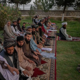 Members of the Taliban perform their evening prayers in Kabul, Afghanistan on Sept. 20, 2021. (Photo via Getty Images)