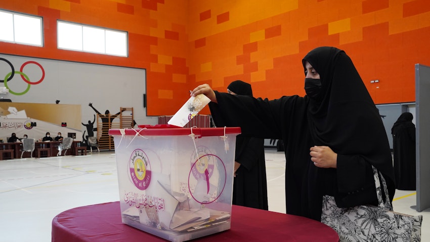 Qataris cast their ballots during the country's first legislative elections in Doha on Oct. 2, 2021. (Photo via Getty Images)