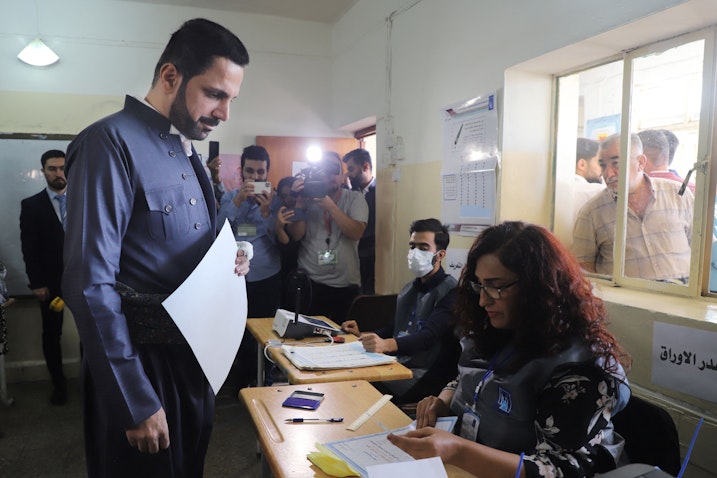 Shaswar Abdulwahid, the head of the New Generation Movement, registers to cast his vote for the Iraqi parliamentary elections in Sulaimaniyah, Iraq on Oct. 10, 2021. (Photo via Getty Images)