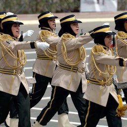 Kuwaiti women march during the graduation ceremony of the first women police officers in Kuwait City on Mar. 25, 2009. (Photo via Getty Images)