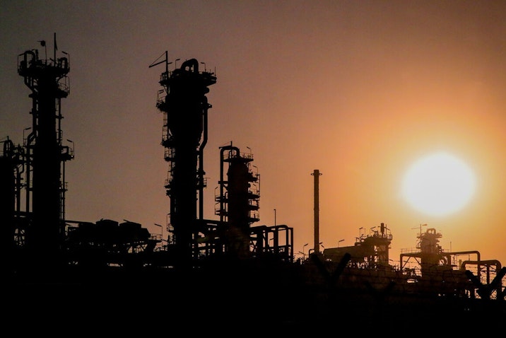 The sun sets in one of the refineries of the South Pars Gas Complex in Assaluyeh, Iran on Oct. 19, 2021. (Photo by Narges Mokhtar via Shana)