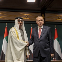 Turkish President Recep Tayyip Erdoğan (R) and Abu Dhabi Crown Prince Sheikh Mohammed bin Zayed Al Nahyan (L) pose for a photo in Ankara, Turkey on Nov. 24, 2021. (Photo via Getty Images)