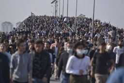 Hundreds of students demonstrate at the University of Suleimani in Sulaimaniyah, Iraq on Nov. 23, 2021. (Photo via Getty Images)