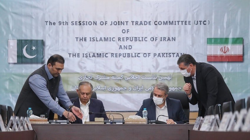 Iranian Industry, Mining and Trade Minister Reza Fatemi Amin and the Adviser for Commerce and Investment to Pakistani Prime Minister attend the Iran-Pakistan Joint Economic Committee conference in Tehran on Nov. 7, 2021. (Photo by Ali Haddadi Asl via Mehr News Agency)