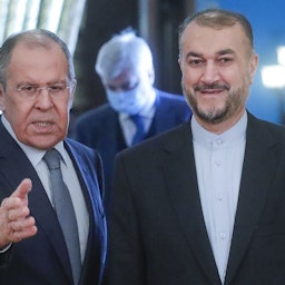 Russia's Foreign Minister Sergei Lavrov (L) and Iran's Foreign Minister Hossein Amir-Abdollahian meet in Moscow on Oct. 6, 2021. (Photo by TASS via Getty Images)