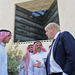 Then Saudi foreign minister Adel Al-Jubeir (L) and his British counterpart and now Prime Minister Boris Johnson (R) in Jeddah on Jan. 25, 2018. (Photo via Getty Images)