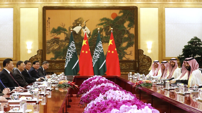 Saudi Crown Prince Mohammed bin Salman (R) attends a meeting with Chinese President Xi Jinping (L) in Beijing on Feb. 22, 2019. (Photo via Getty Images)
