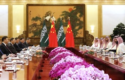 Saudi Crown Prince Mohammed bin Salman (R) attends a meeting with Chinese President Xi Jinping (L) in Beijing on Feb. 22, 2019. (Photo via Getty Images)